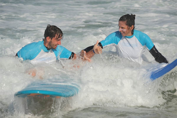 cours de surf pour séminaire au cap de l'homy lit et mixe